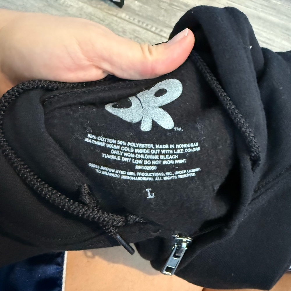 OLIVIA RODRIGO Black Zip-Up Hoodie with Guts Logo - Picture 2 of 3